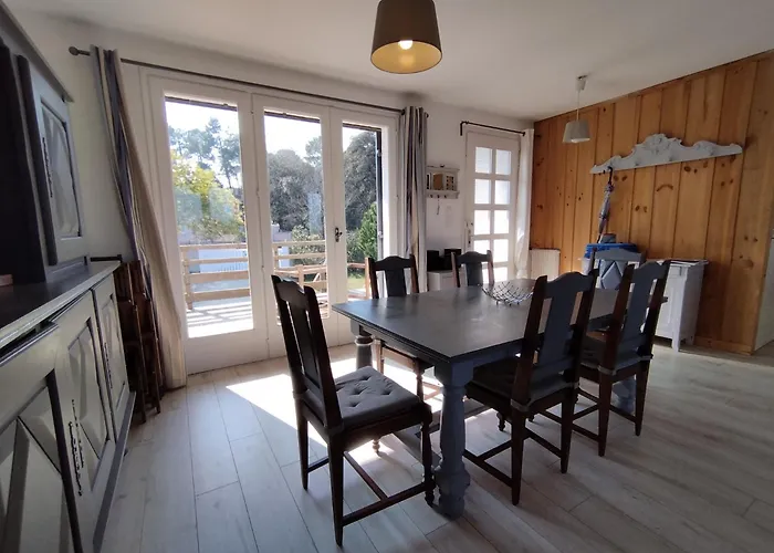 De Jo * Grand-Village-Plage